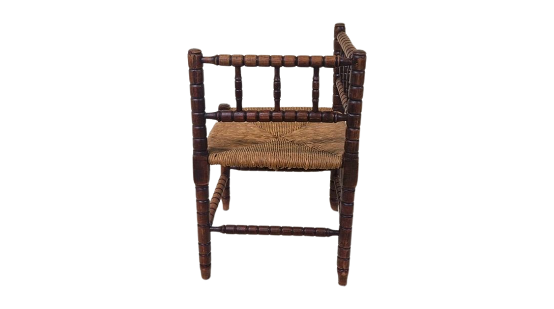 Antique French Bobbin oak wood corner chair with woven wicker seat