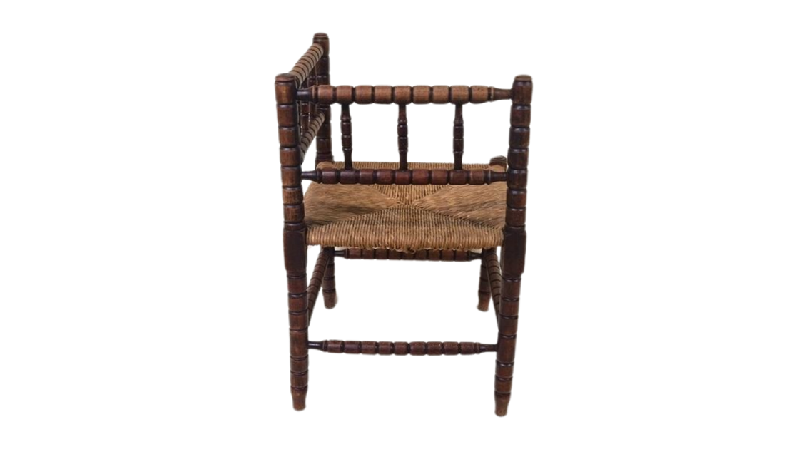 Antique French Bobbin oak wood corner chair with woven wicker seat