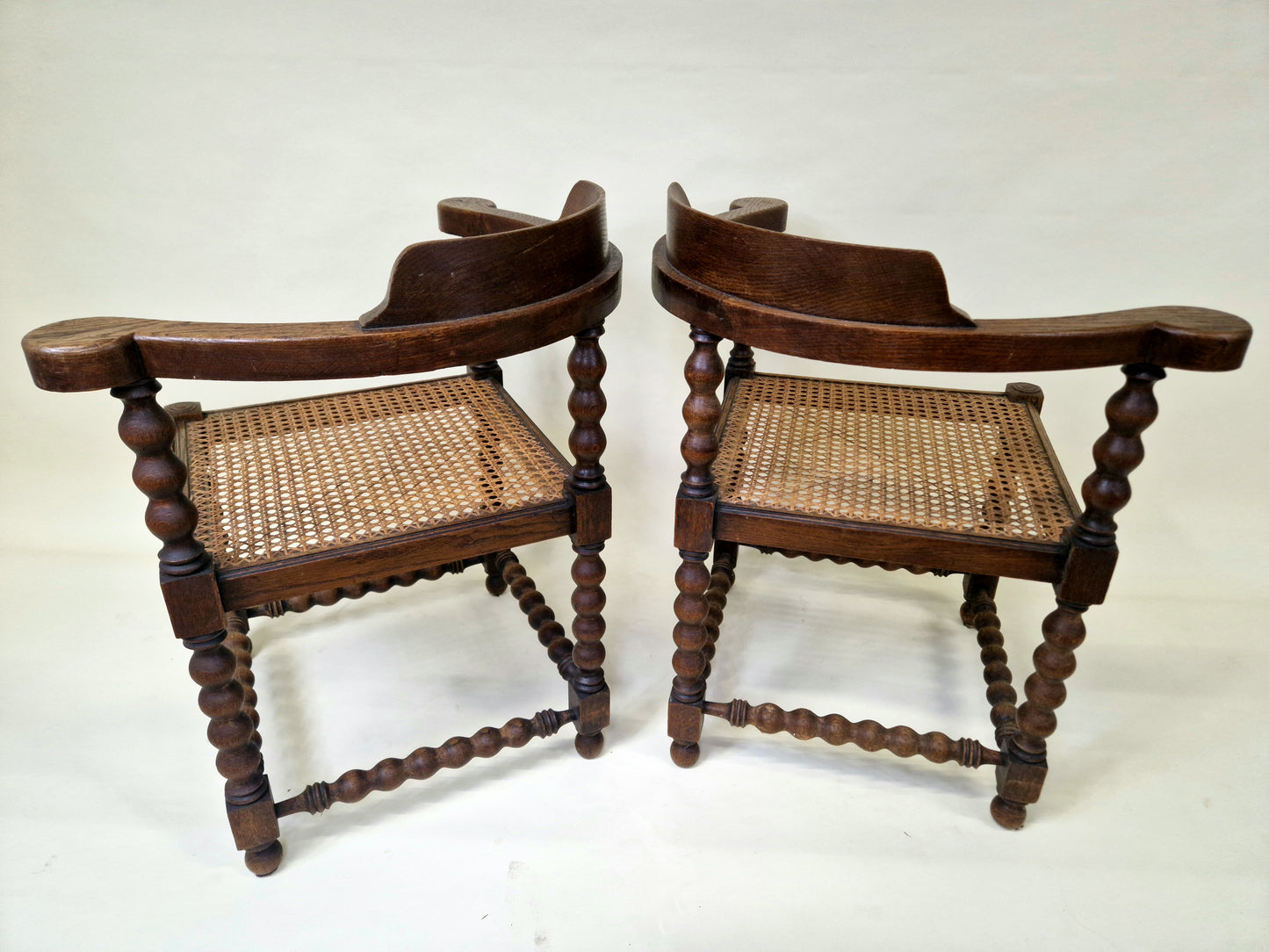 Set of 2 Antique French Bobbin Corner Chairs from the 1920s with rattan seat