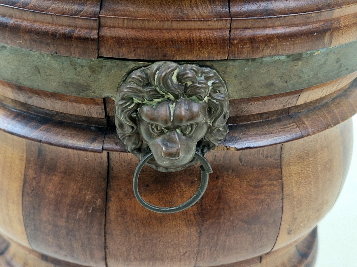 Beautiful antique english wooden and copper plant holder, decorated with lions heads from the early 20th century