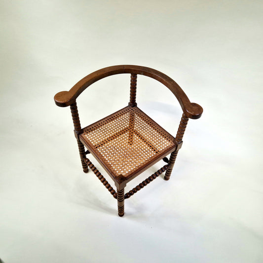 Antique French Bobbin Corner Chair from the 1920s with rattan seat